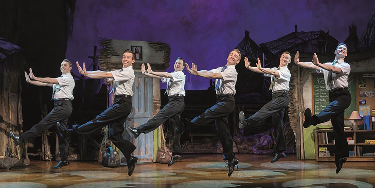 The cast of The Book Of Mormon London, now playing at the Prince Of Wales Theatre (Photo: Johan Persson)