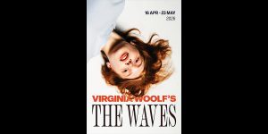 A woman with wavy red hair lies on her back, looking upwards against a white background.